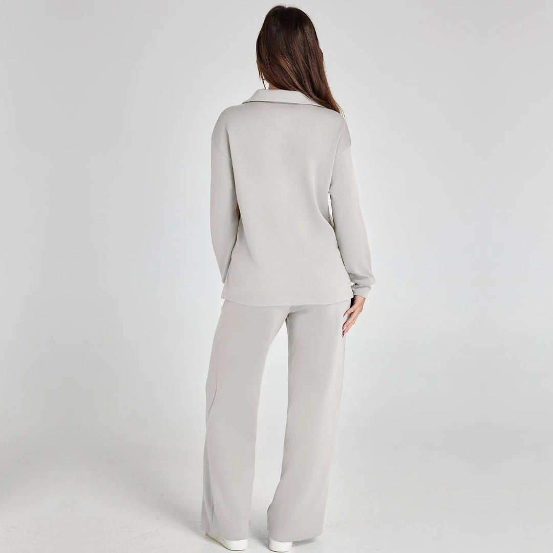 Moderner Damen Zweiteiler: V-Ausschnitt Pullover & weite Hose für stilvolle Alltagskleidung.