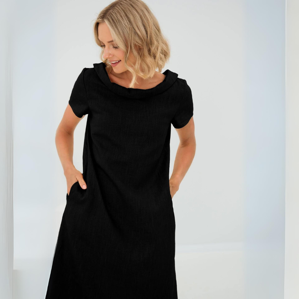 Zeitloses Damen Midikleid mit Rundhalsausschnitt. Ein elegantes und komfortables Kleid für viele Gelegenheiten.
