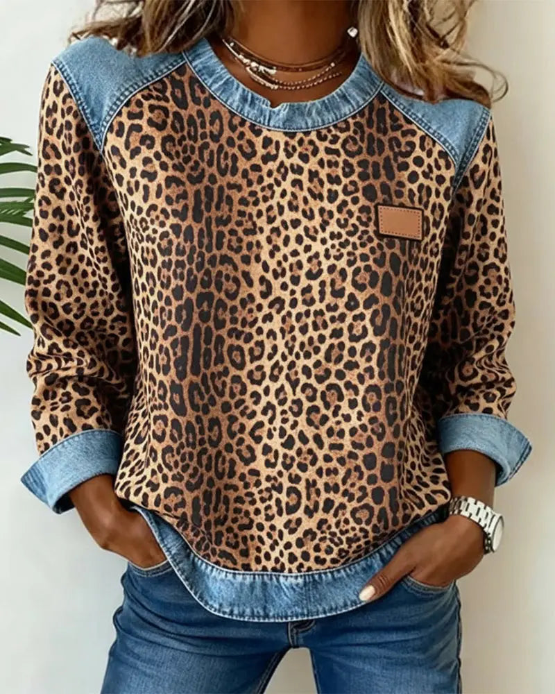 Trendiger Damenpullover, Leopardenmuster Patchwork, Stehkragen mit Reißverschluss. Ideal für Alltagsmode.