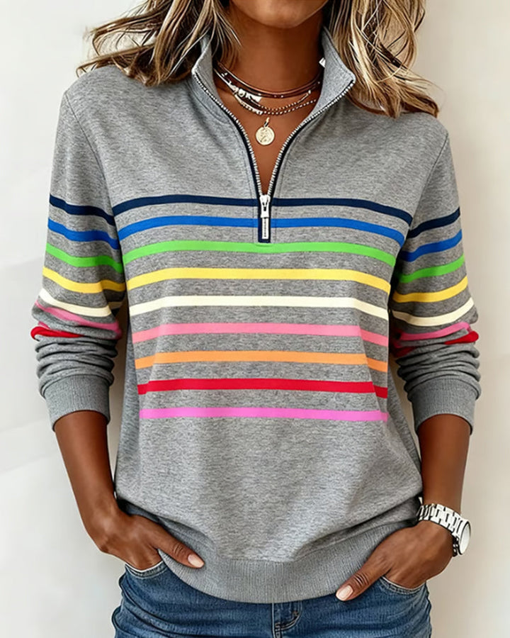 Modischer Damenpullover mit Pastellstreifen, lockerer Schnitt, vielseitige Strickware für kühle Tage.