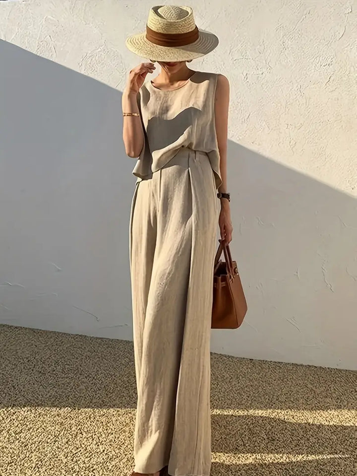 Sommerlicher Zweiteiler: Elegantes Damen Leinen Set mit ärmelloser Bluse und bequemer Leinenhose, ideal für Urlaub.