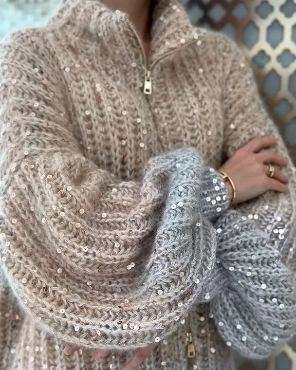 Warme Damen-Cardigan mit funkelndem Glitzer, ideal als gemütliche Bekleidung für kühle Tage.