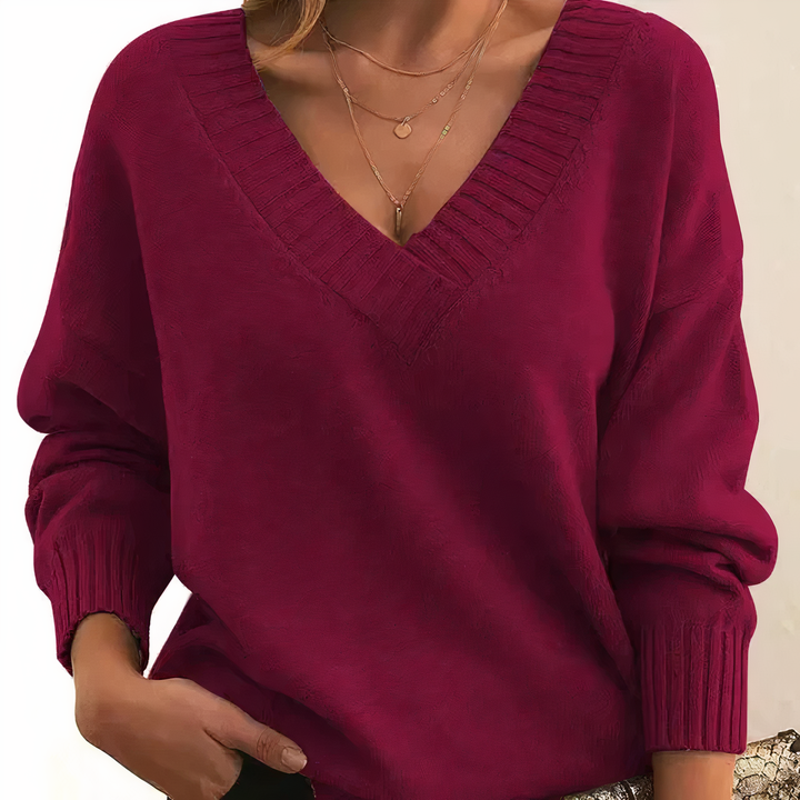 Hochwertiger Damen Strickpullover mit V-Ausschnitt. Ein Muss für Damenmode in Herbst und Winter.