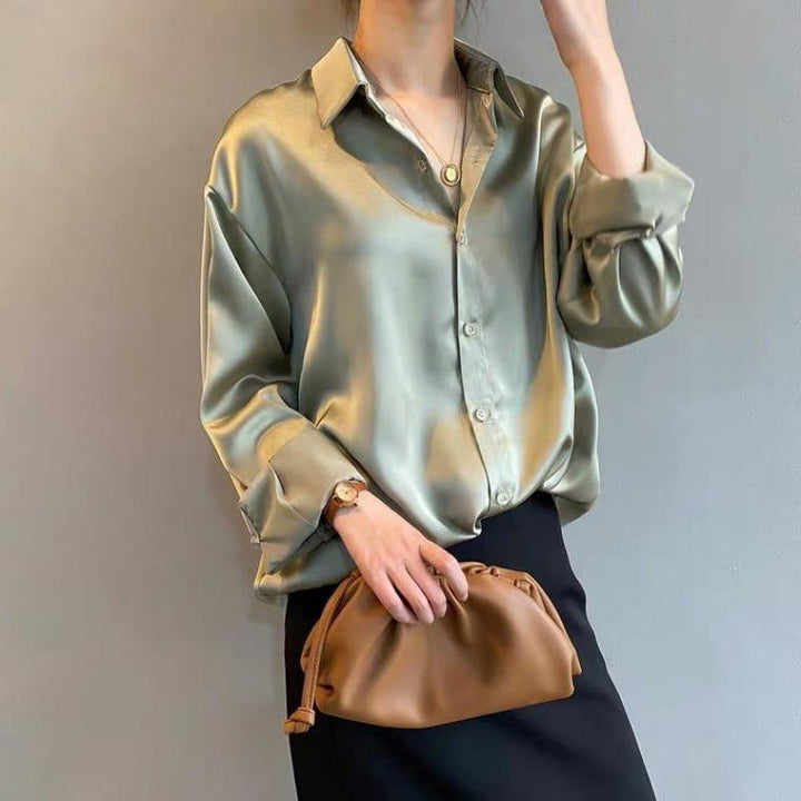 Glänzende elegante Damen Langarm Bluse. Luftig für den Sommer, perfekt für festliche Anlässe.