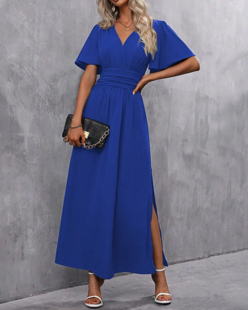 Detaillierte Ansicht des Stoffes vom eleganten Damen Maxikleid, ein figurbetontes Abendkleid mit Seitenschlitz.
