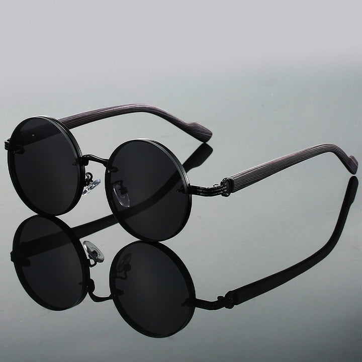Ikonische runde Retro Sonnenbrille mit UV400 Schutz, unisex Design, hochwertiges Metallgestell.