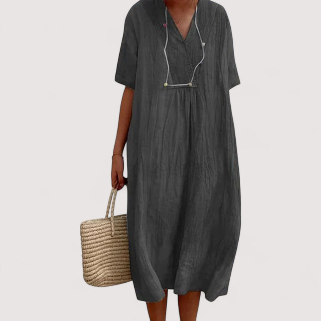Vielseitiges, gemustertes Damenkleid. Lockere, bequeme Passform; ideal als Sommer- oder Reisekleid.