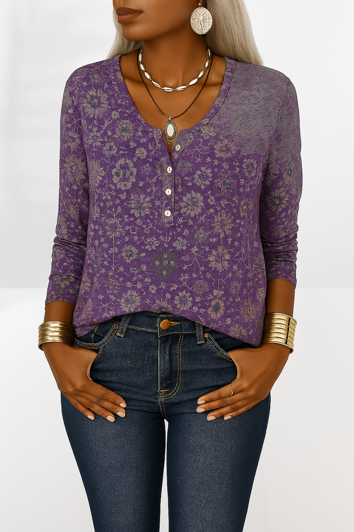 Modische Boho Damenbluse mit floralem Design. Langarm, locker fallend und V-Ausschnitt für einen stilvollen Casual-Look.