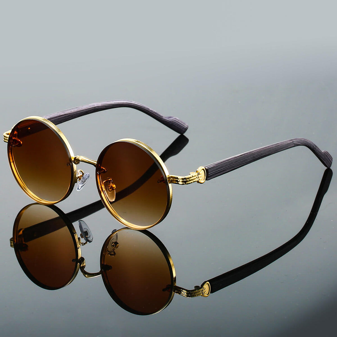 Klassische runde Sonnenbrille im Retro-Look für Damen & Herren, UV400 Schutz, feines Metallgestell.