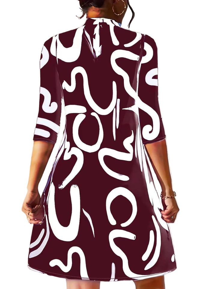 Damen Freizeit Mini-Kleid mit aufwendigem Print, smartem Kragen & Langarm. Komfortables & stilvolles Kragenkleid.