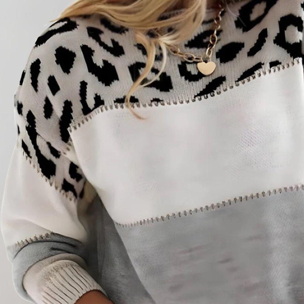 Weicher Damen Strickpullover mit modischem Farbblock-Design und elegantem Leopardenmuster. Langarm-Freizeitmode.