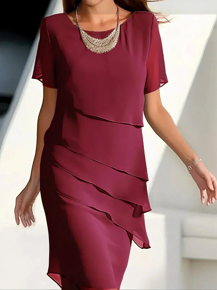 Blaues, figurschmeichelndes Midi Lagenkleid für Damen, perfekt als Abendkleid oder Partykleid.