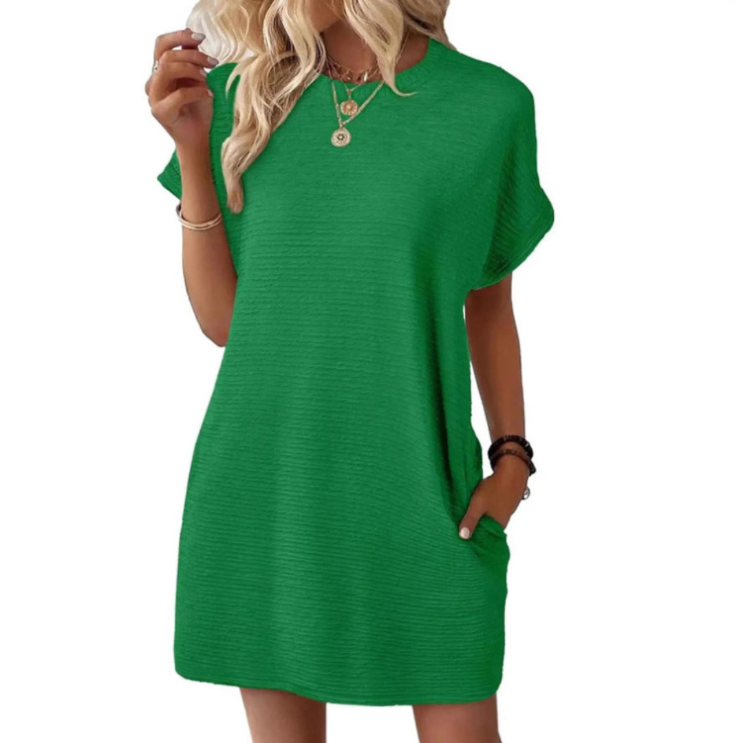 Knielanges Damen T-Shirtkleid, perfekt als Sommerkleid, mit praktischen Taschen und bequemer Schnittführung.
