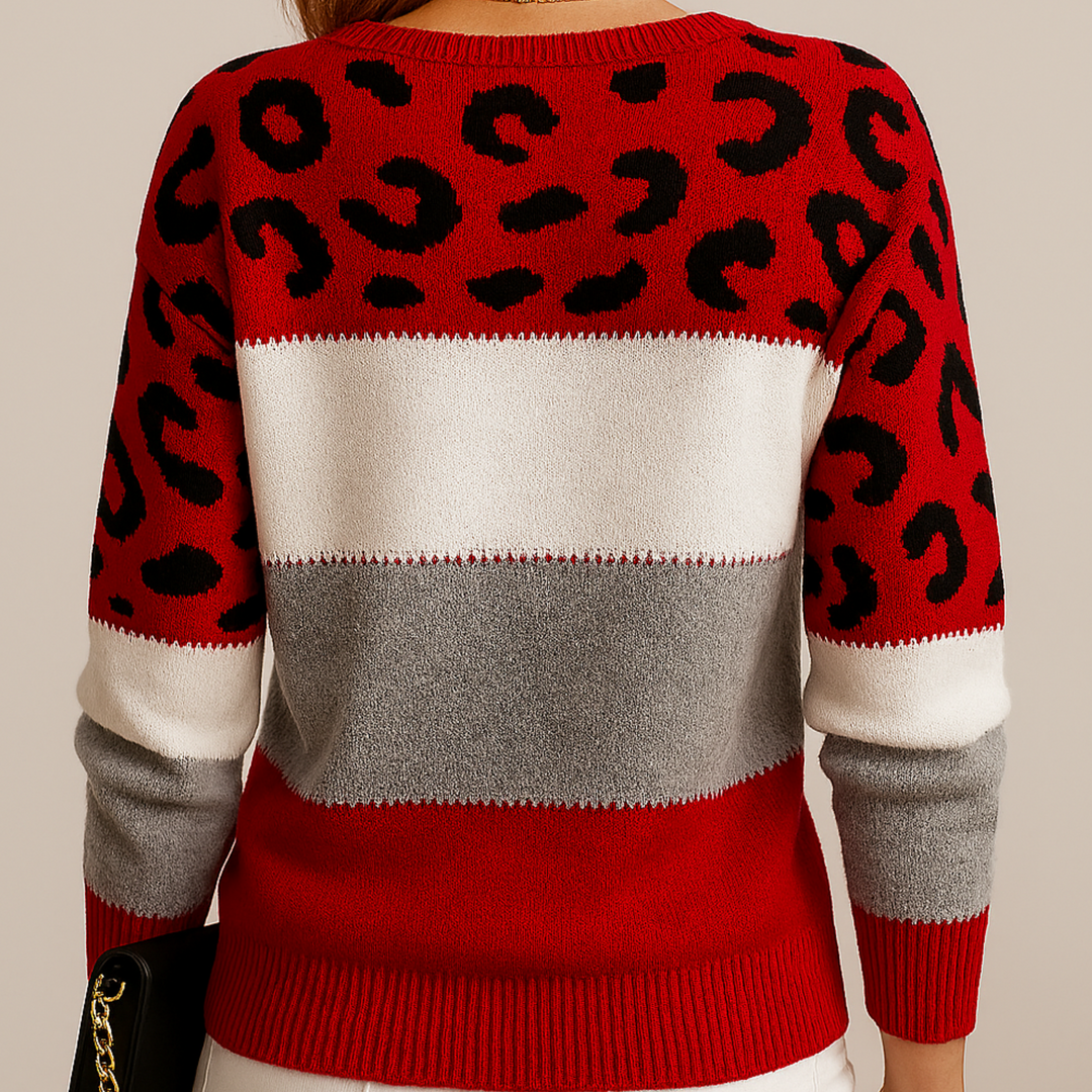 Modischer Damen Strickpullover mit weichem Griff. Farbblock und wildes Leopardenmuster für einen trendigen Look.
