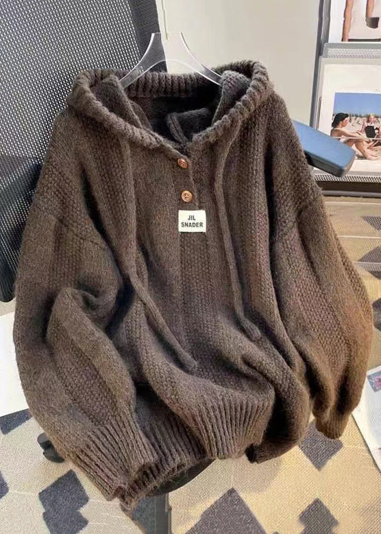 Bequemes Damen Kapuzenoberteil mit eleganter Knopfleiste und trendigen Schnürdetails, ideal für Herbst & Winter.