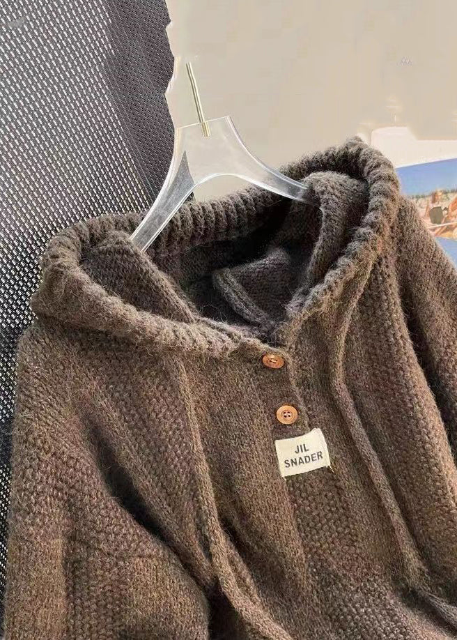 Gemütlicher Damen Pullover mit Kapuze, dezenter Knopfleiste & modischen Schnürdetails. Ideal für kühle Herbsttage.