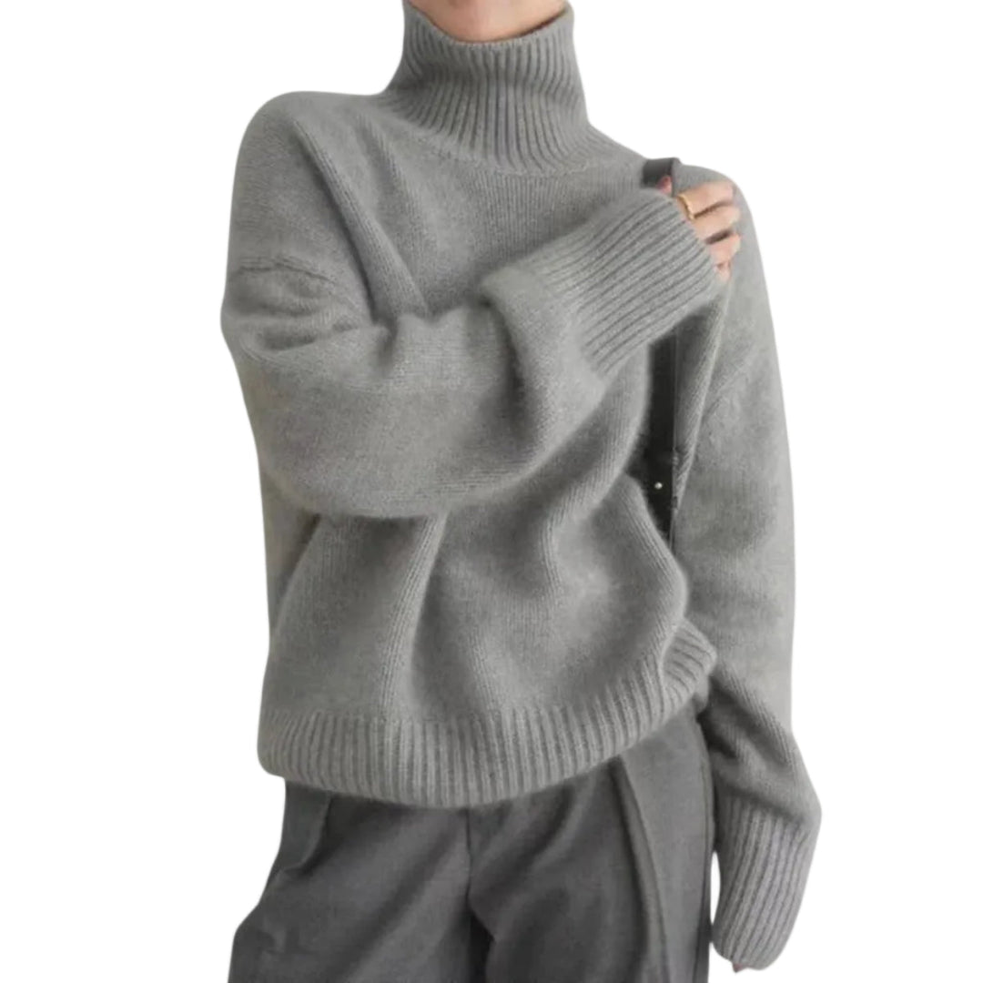 Bequemer Rollkragen Strickpullover für Damen in Grau. Langarm mit gerippten Bündchen; ideal für Herbst & Winter.