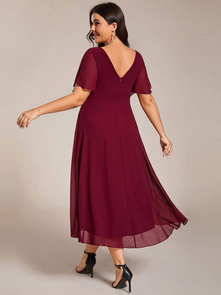 Festliches Abendkleid Vokuhila, Kurzarm, Midi-Länge, ideal für Dinner & Empfänge.