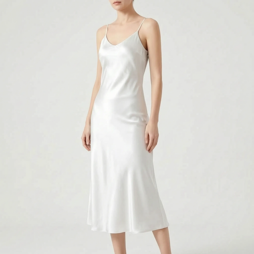 Damen Freizeitkleid in Midilänge mit elegantem Schwung, ideal als Sommerkleid mit zeitloser Eleganz.