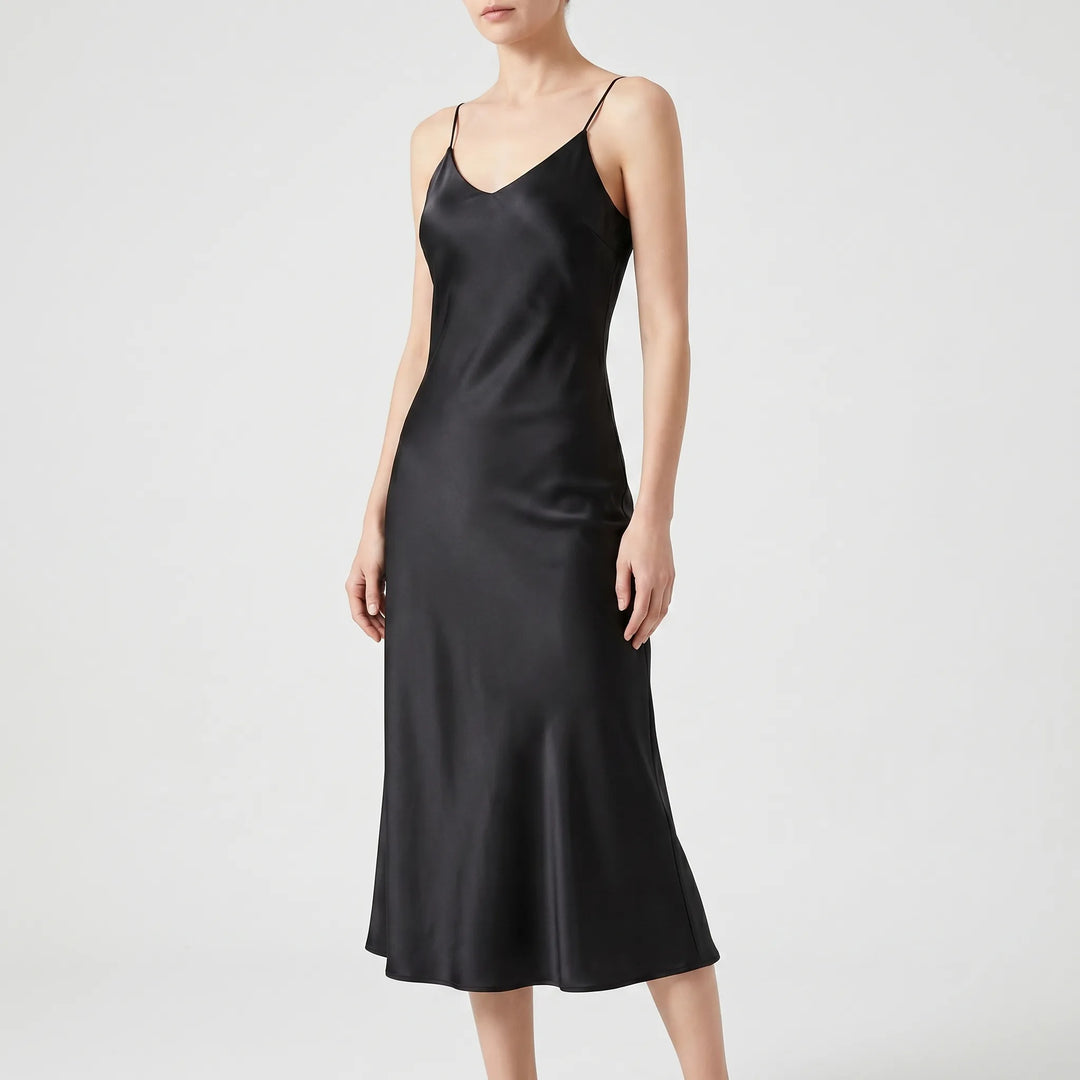 Hochwertiges, elegantes Damenkleid in Midilänge mit V-Ausschnitt und schmalen Trägern, ideal für Feiern.