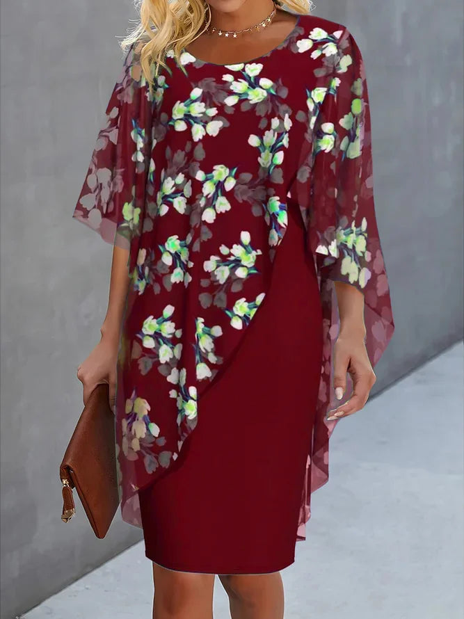 Festliches Damen Blumenkleid mit Capeärmeln. Fließendes Midikleid, perfekt als Hochzeitsgastkleid oder elegantes Partykleid.