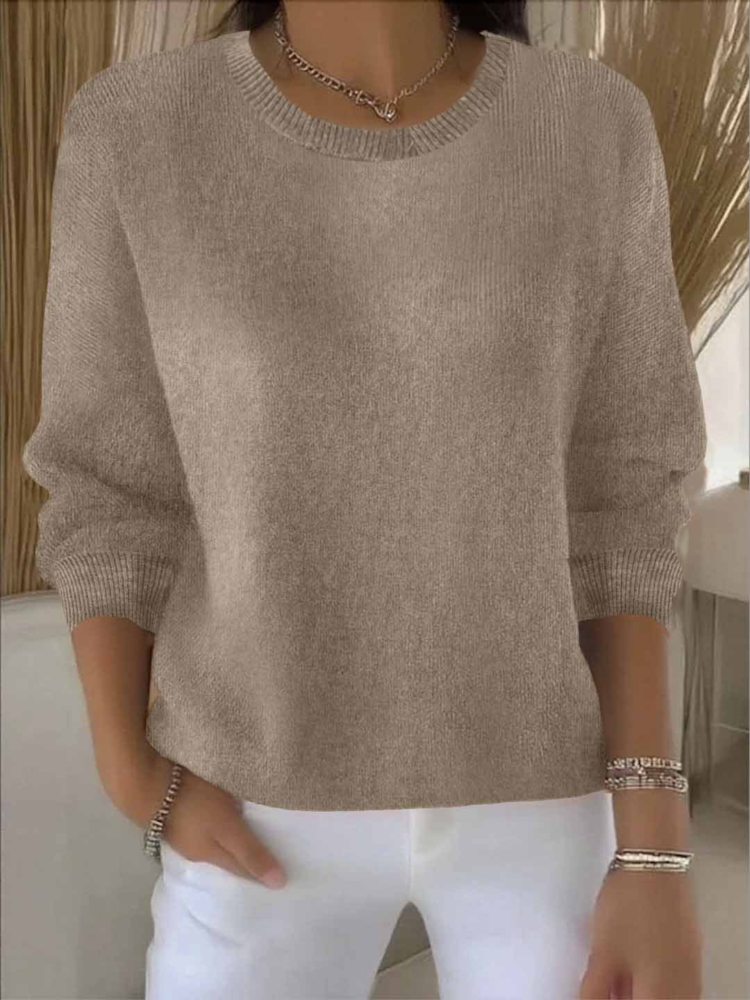 Detail des Bündchens am eleganten Damen-Strickpullover, hochwertiger Strick für kalte Tage.