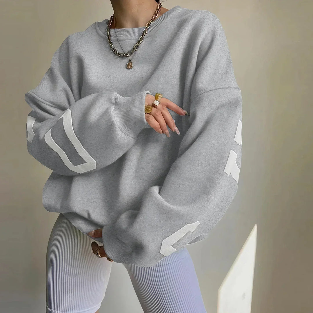 Damen Oversized Pullover mit lockerem Schnitt, Langarm. Ideal für bequeme Alltags- und Freizeitmode.