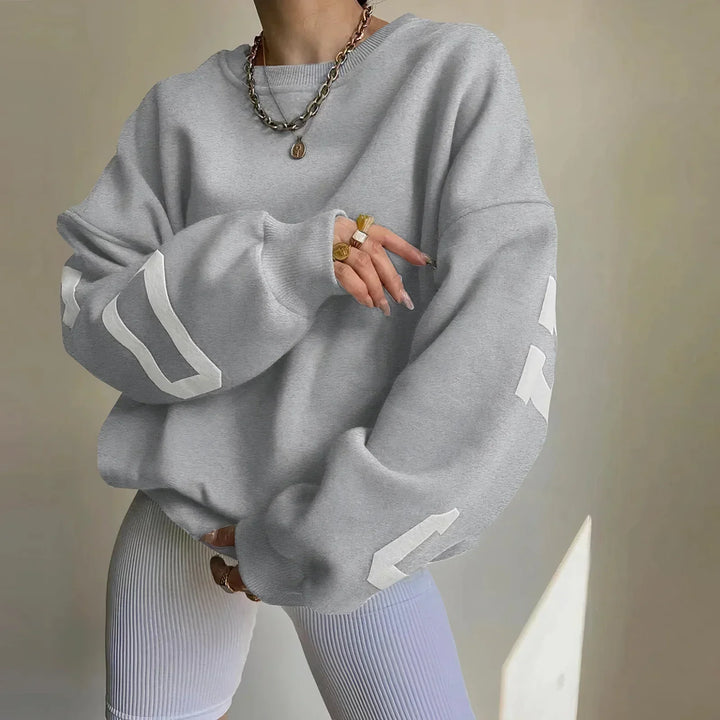 Damen Oversized Pullover mit lockerem Schnitt, Langarm. Ideal für bequeme Alltags- und Freizeitmode.