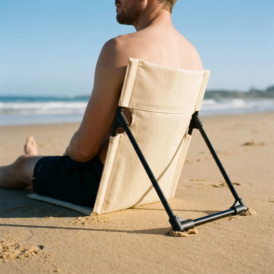Faltbarer Bodenstuhl für Outdoor, Camping & Strand. Leichtes Design mit verstellbarer Rückenlehne, ideal für Festivals.