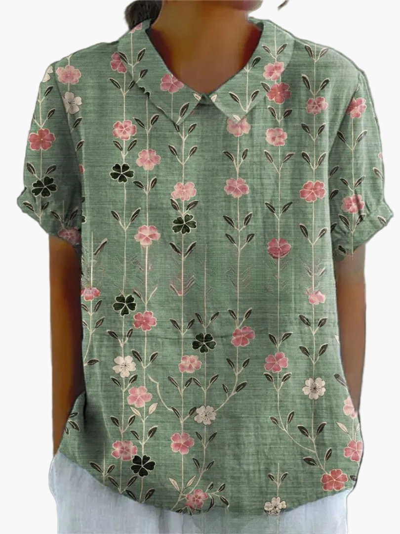 Elegante Vintage-Bluse für Damen; Kurzarm mit zartem Blumenmuster.