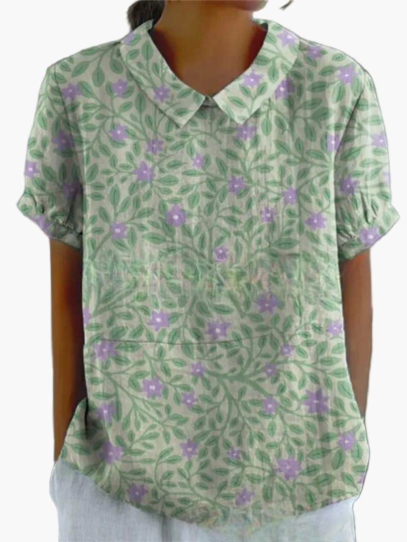 Weiße Damenbluse mit floralem Retro-Muster; Elegant & Kurzarm für den Sommer.