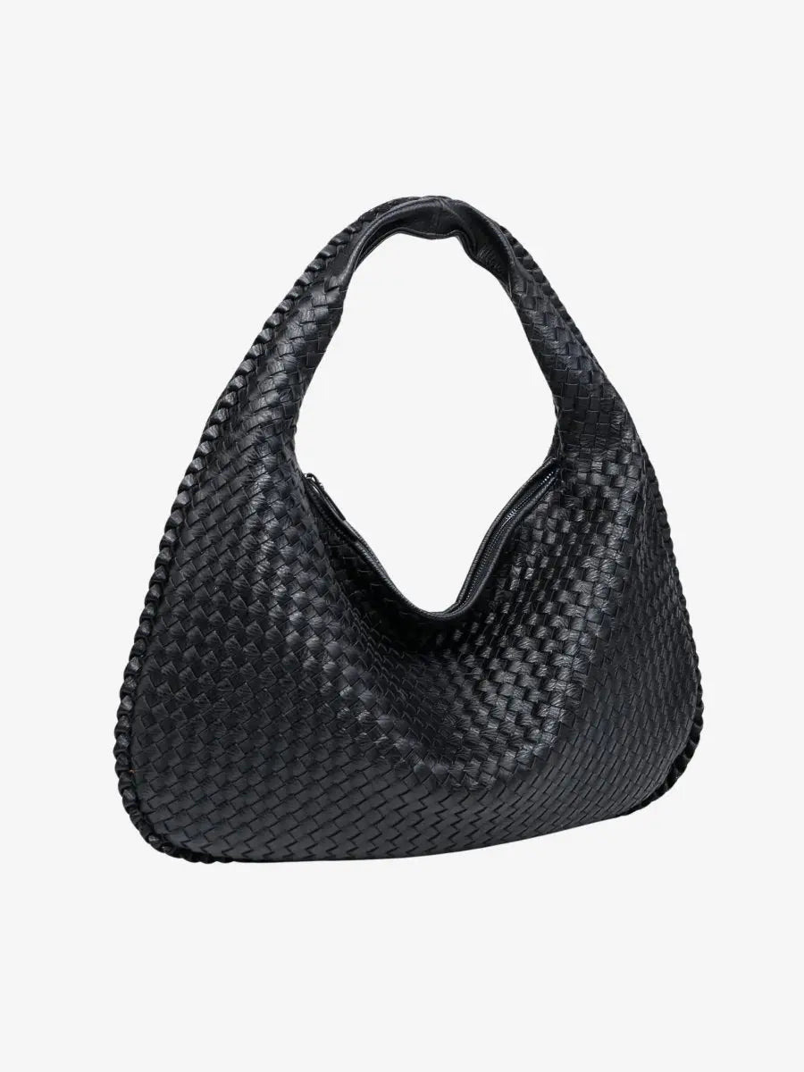 Stilvolle Damen Handtasche mit Flechtoptik, geräumig und praktisch, als elegante Alltagstasche tragbar.