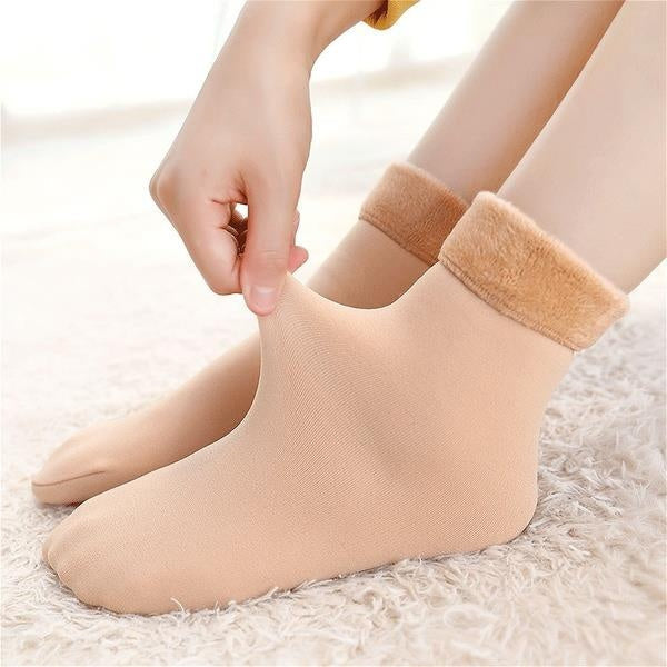 Premium Thermosocken für Damen & Herren, extra warm gefüttert, perfekt für Ski, Wandern und andere Winteraktivitäten.