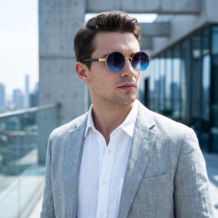 Trendige runde Sonnenbrille mit UV400 Schutz, perfekt für Damen & Herren, schwarzes Metallgestell.