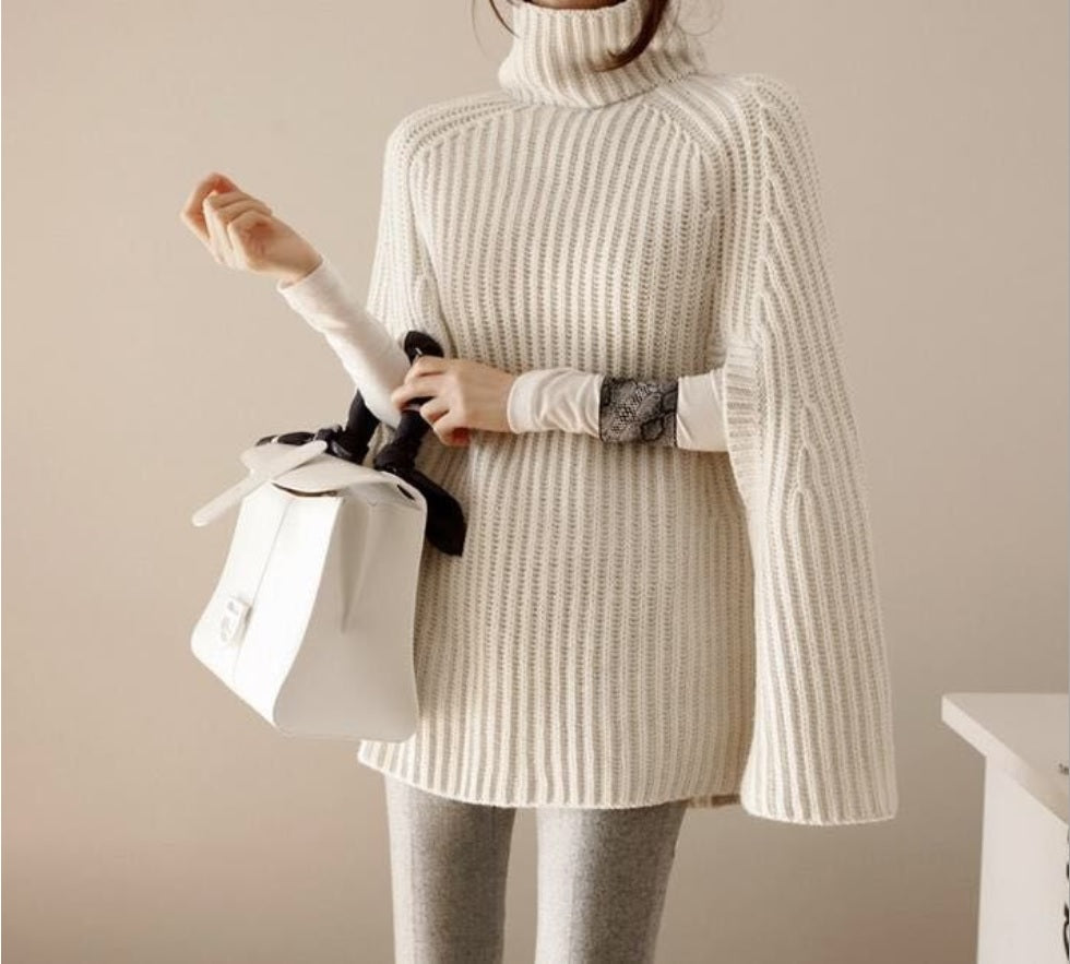 Kuscheliges Damen Winterset mit warmem Rollkragenpullover, Daunenjacke & Hose für kalte Tage.