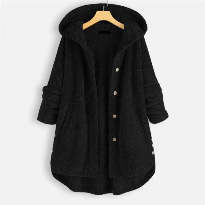 Nahaufnahme der Textur einer hochwertigen Damen Wendjacke mit Kapuze. Weicher Stoff für optimalen Komfort.