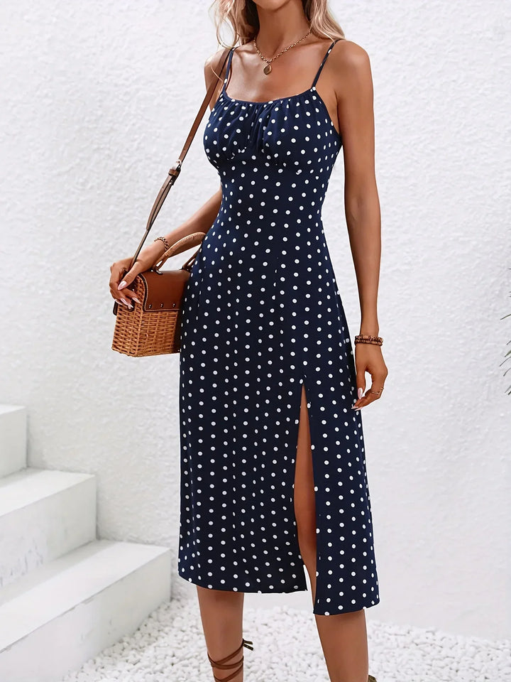 Elegantes Damen Blumen Midikleid mit Spaghettiträgern und schmeichelhafter A-Linie für den Sommer.