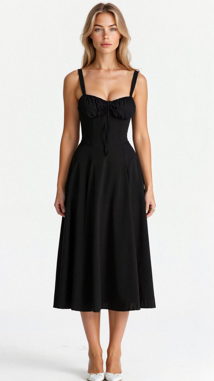 Feminines Cocktailkleid in Midilänge, mit formendem Korsett-Oberteil für eine schlanke Silhouette.