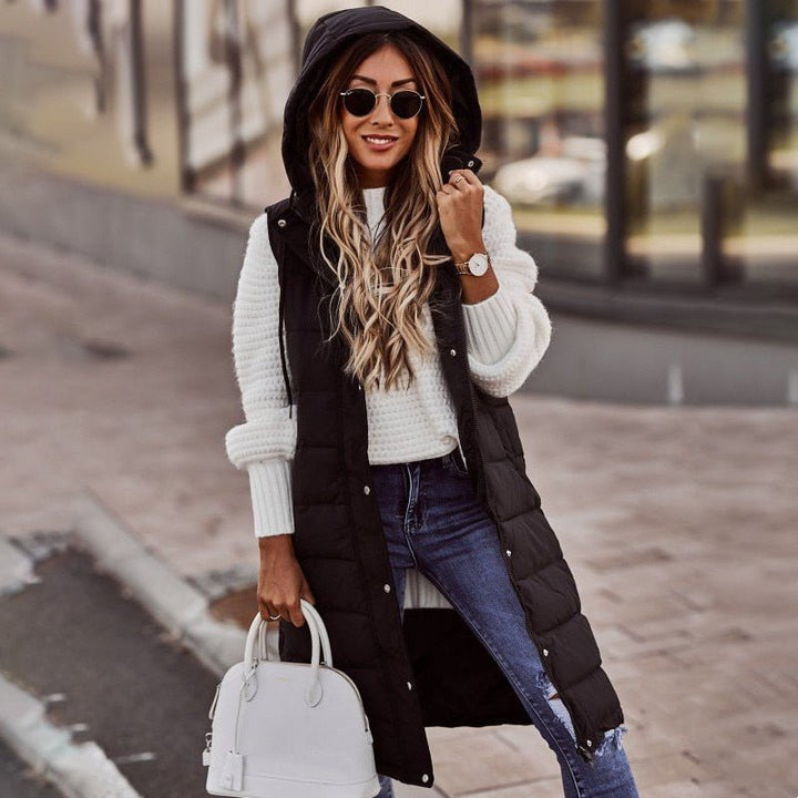 Damen knielange Steppweste für stilvolle Wärme im Herbst & Winter, ideal als Übergangsjacke.