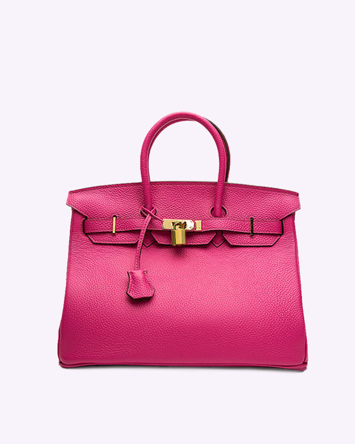 Luxuriöse Damen Lederhandtasche mit elegantem Schloss, geräumig für alle Essentials.