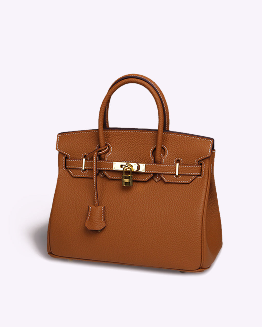 Geräumige Damenhandtasche aus echtem Leder mit robustem Schloss. Vielseitige Alltagstasche.