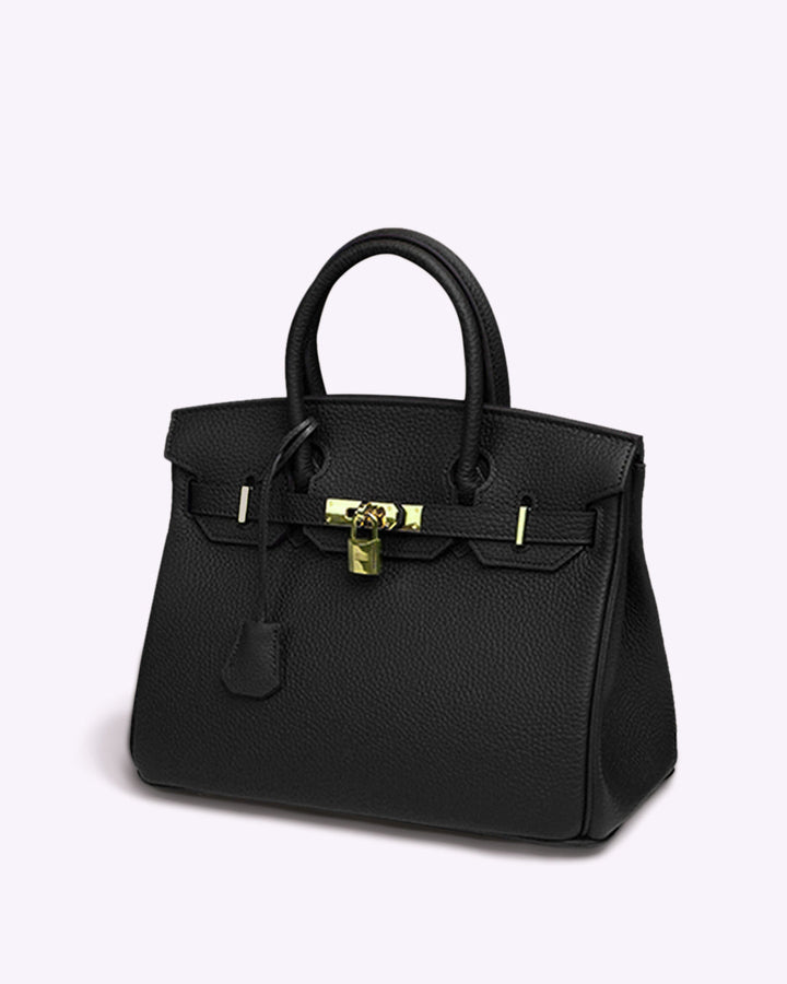 Frontansicht: Stilvolle Damen Lederhandtasche mit prägnantem Schloss, elegant & geräumig.