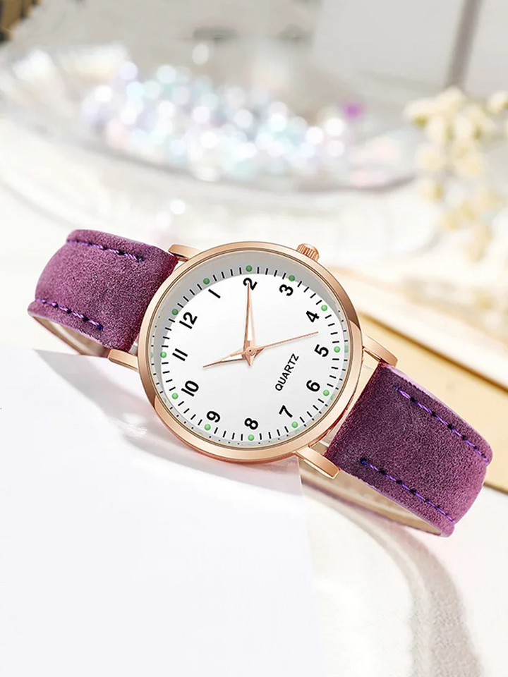 Schlichte Roségold Damenuhr mit Lederarmband & minimalistischem Zifferblatt für zeitlose Eleganz.