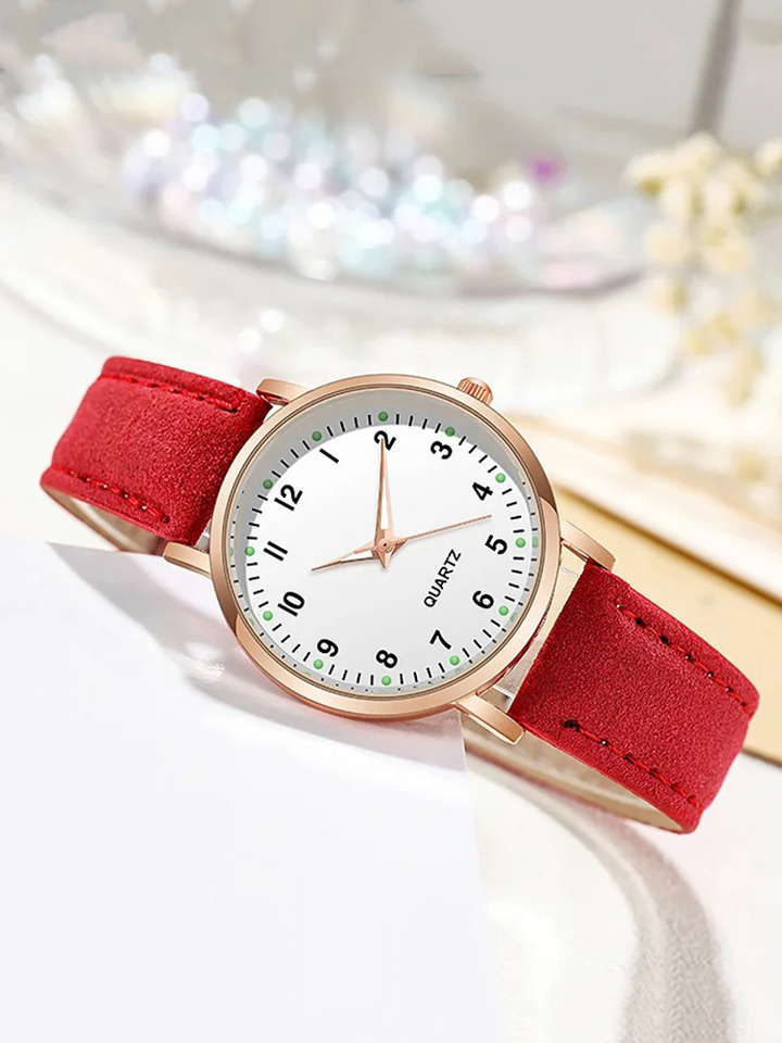 Hochwertige Damen Roségold Armbanduhr mit Lederband, präzise und stilvoll. Ein Must-have Schmuckstück.