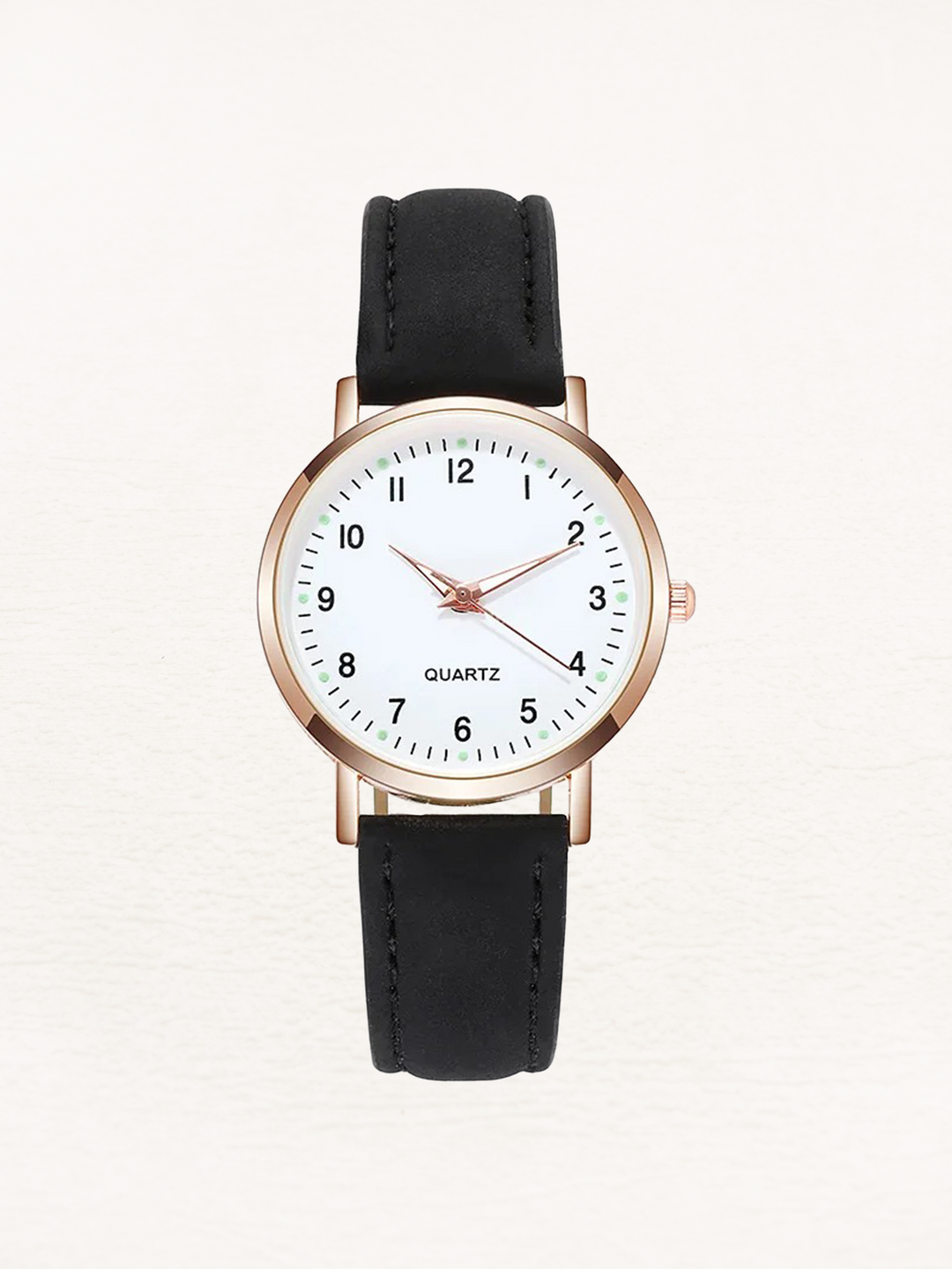 Glänzende Roségold Damenuhr mit minimalistischem Zifferblatt und weichem Lederarmband. Exklusiver Schmuck.