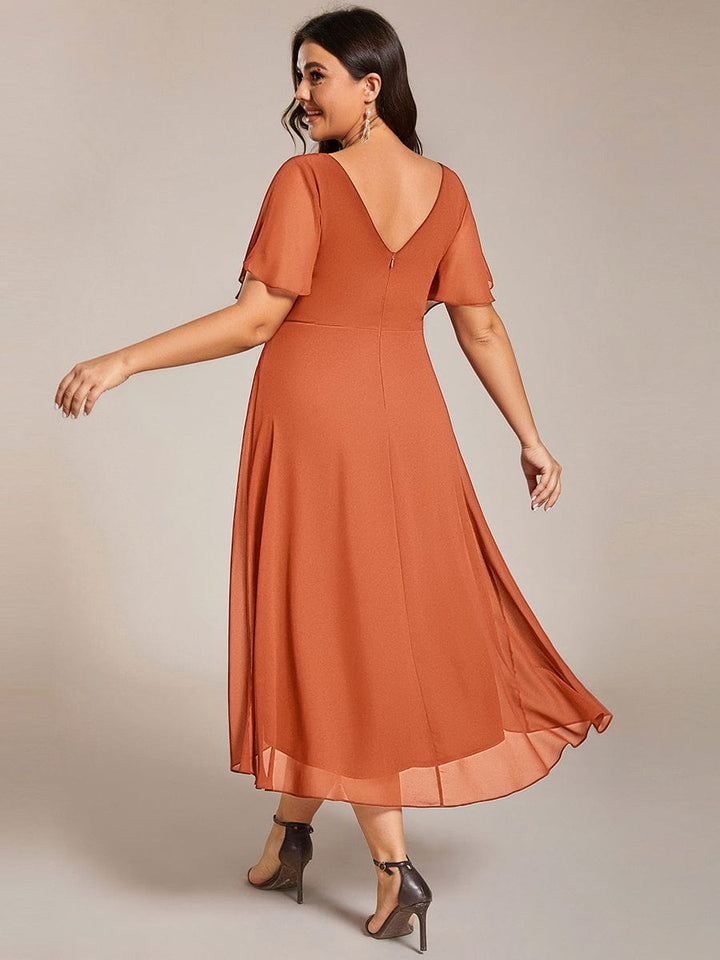 Schickes Vokuhila Cocktailkleid, Kurzarm, Midi-Länge, für stilvolle Abendpartys.