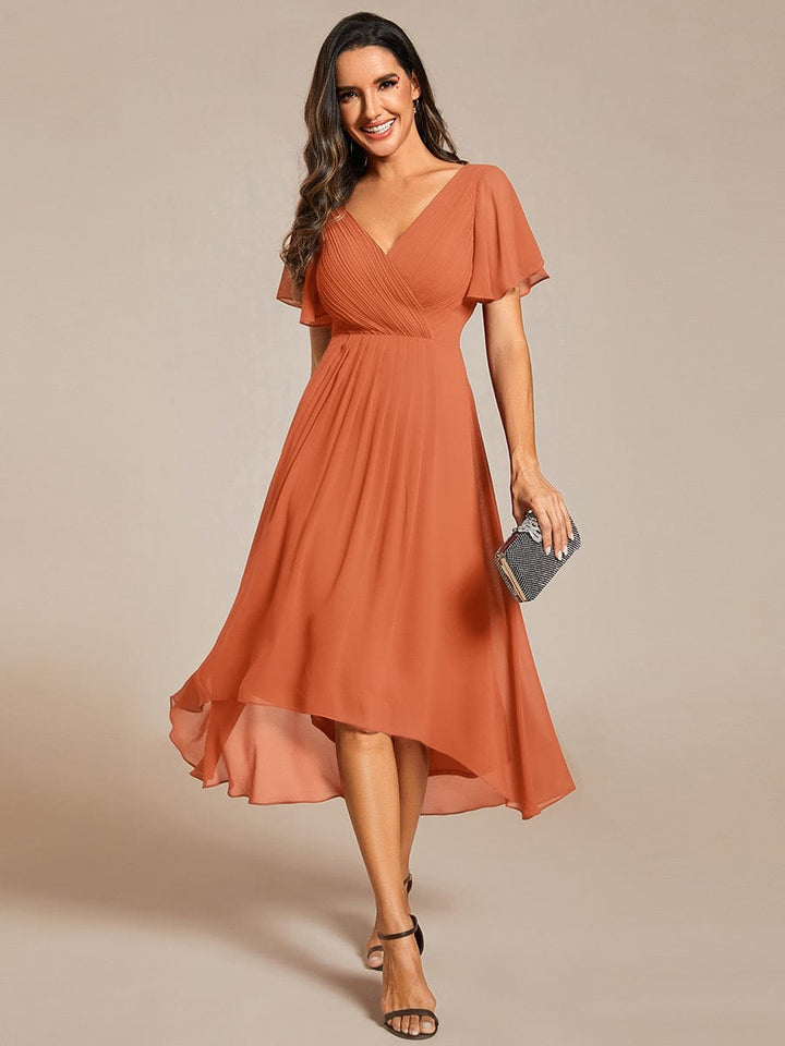 Stilvolles Vokuhila Cocktailkleid, Kurzarm, Midi-Länge, elegant für jede Feier.