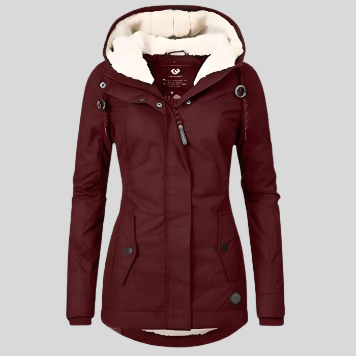 Hochwertiger Damen Wintermantel: lang, warm, wasserdicht, mit Kapuze für maximalen Komfort.