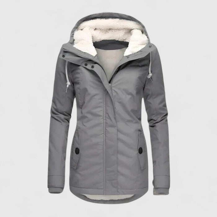 Lange, warme Damen Freizeitjacke mit Kapuze, wasserdicht & atmungsaktiv, perfekt für kalte Wintertage.