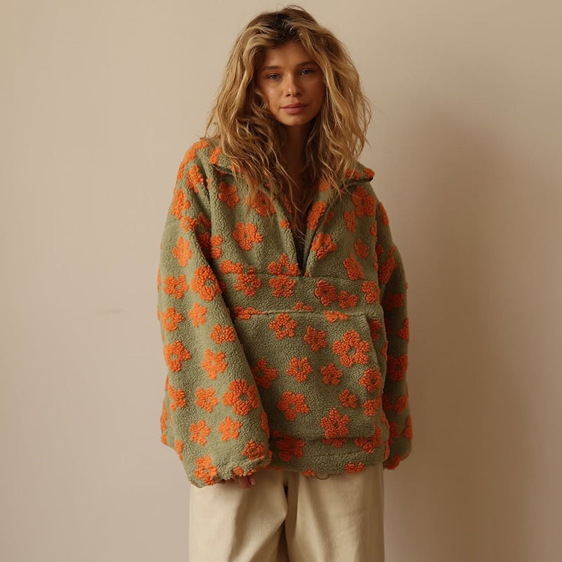 Eleganter Damen-Freizeitpullover mit lebhaftem Blumenmuster. Perfekt für die Herbstsaison.